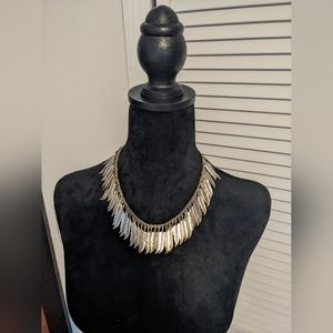 Silver feather necklace, represents freedom and inspiration